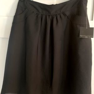 Apostrophe petite Yoke black skirt. New with tags - has front pockets size 8P